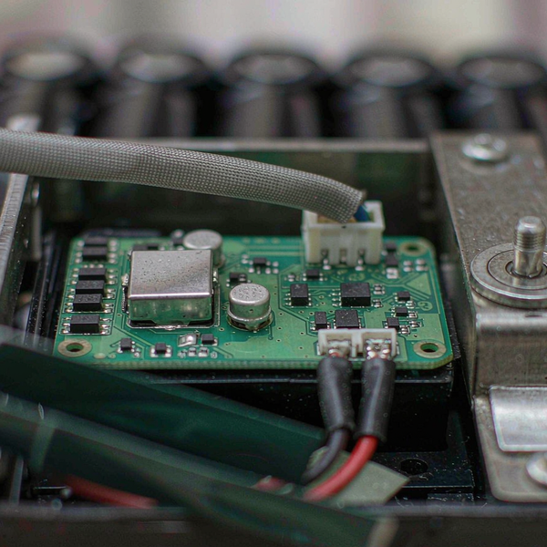 Battery management system board connected to lithium cells